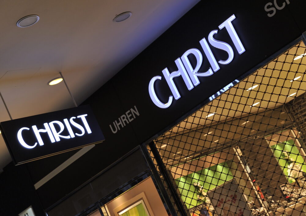 Logo von Christ auf einer Eingangstür